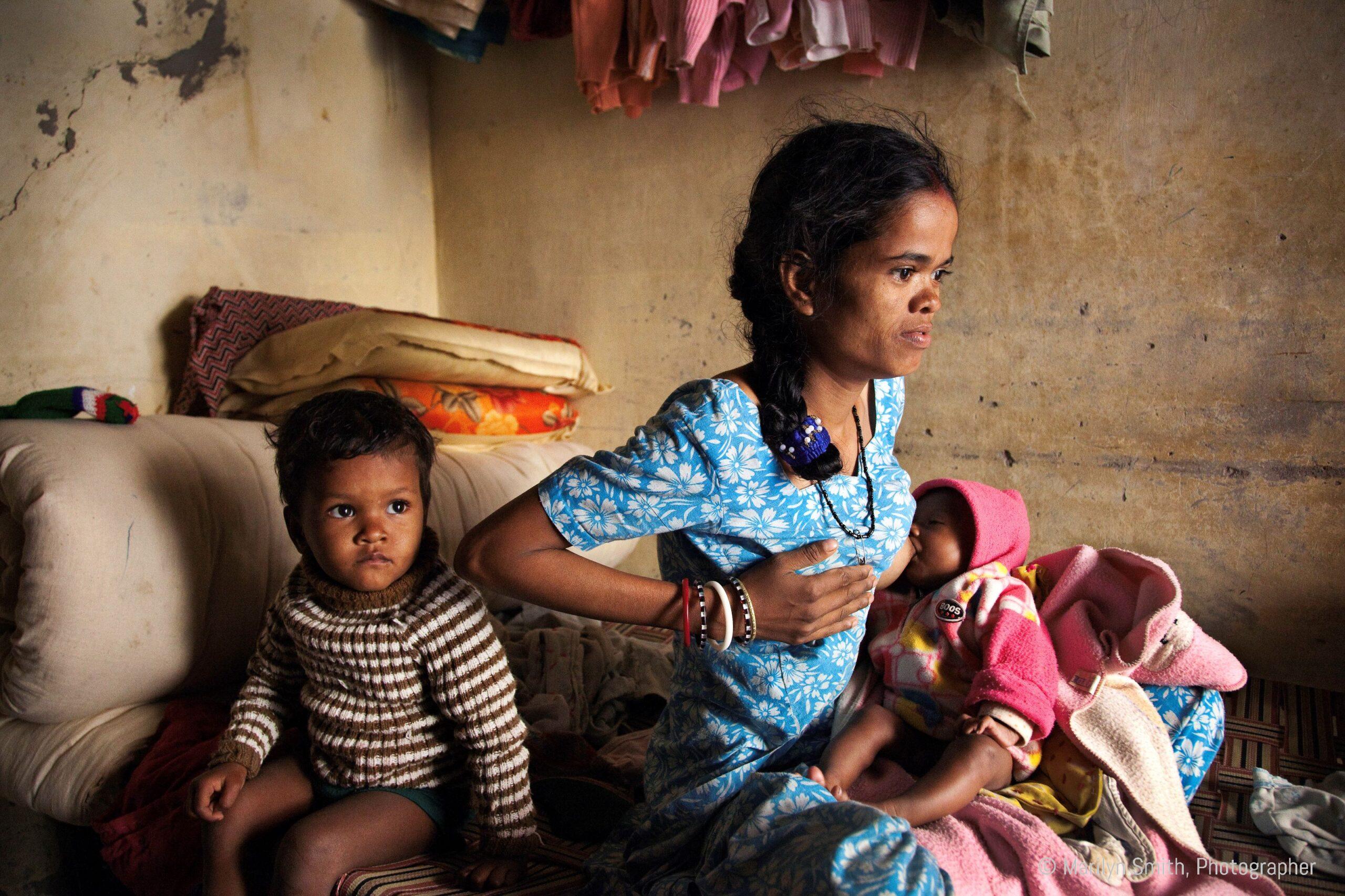 A 21-yr-old woman who weighs only 35 kg with her toddler and newborn.