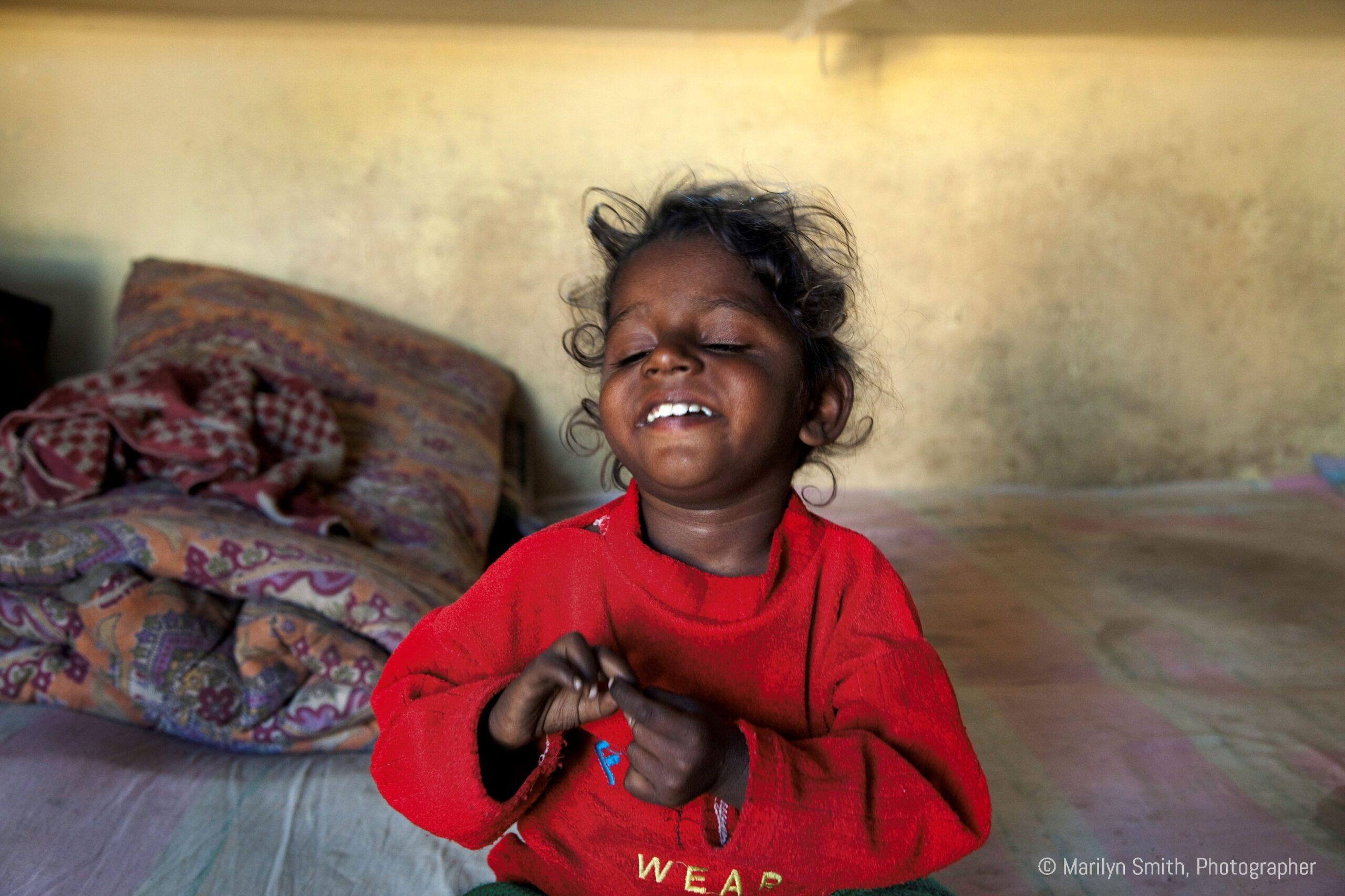 A young child who is blind in Janta Colony.